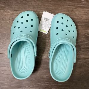 Crocs NWT size 9 women or 7 mens. Color is pure water. Never been worn!